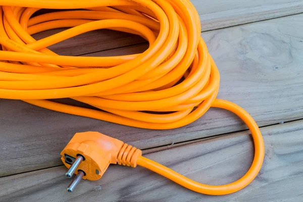 Orange electric extension cord — Stock Photo, Image