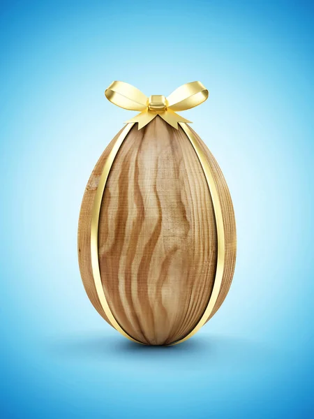 Big Wooden Egg with Golden Ribbon — Stock Photo, Image