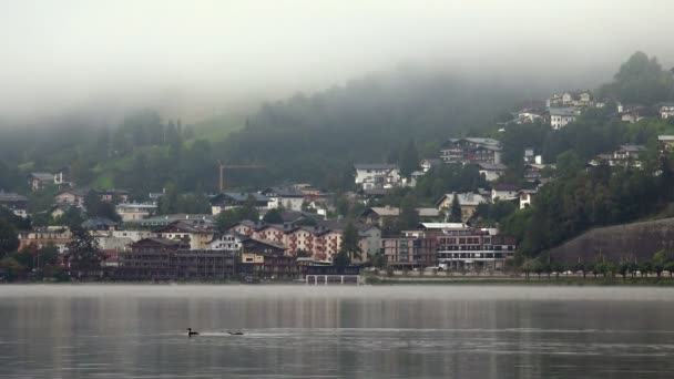 Morning Fog in Mountain Village near the Lake — Stock Video