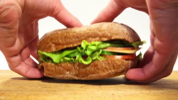 Man Take and Puts Delicious Sandwich — Stock Video