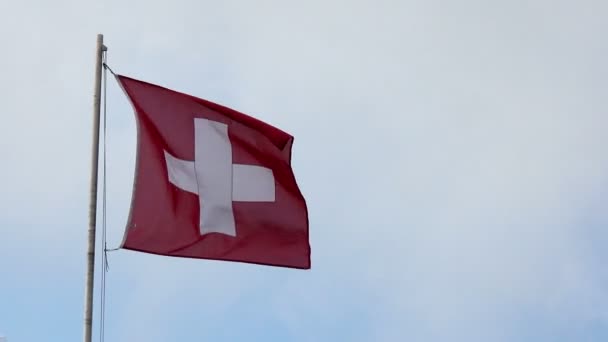 Zwitserland nationale vlag zwaaien in de wind — Stockvideo