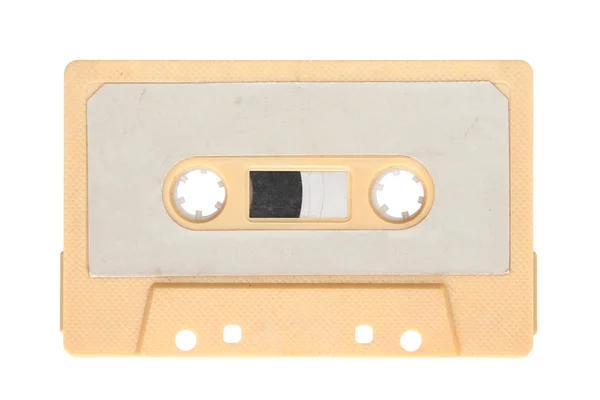 背景に分離された黄色のオーディオ カセット — ストック写真