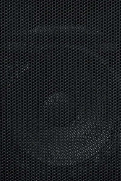 Tło czarne o strukturze plastra miodu — Zdjęcie stockowe