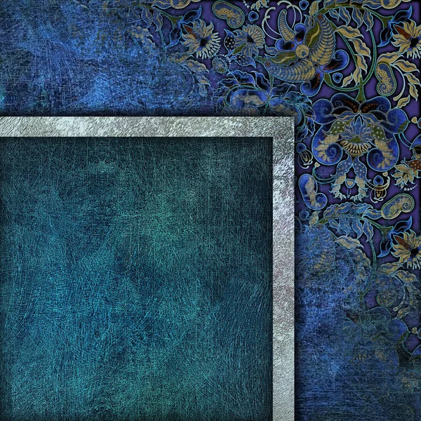 Schäbig gefärbte Blumenmuster auf blauem Hintergrund — Stockfoto