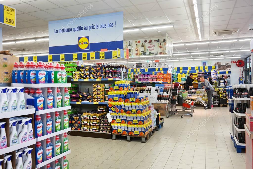 MALMEDY, BELGIUM - JULY 2015: Interior of a Lidl supermarket. stacks of different products. Lidl is a German discount chain, 9800 stores, in 28 countries in Europe.