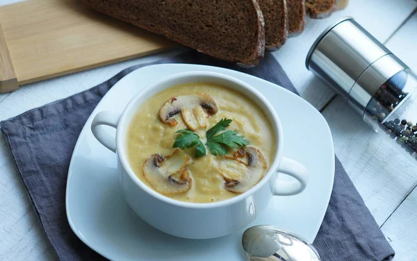 Pumpkin, carrot and Champignon mushrooms soup — Stock Photo, Image