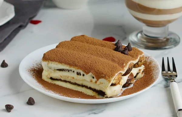 Classic Italian dessert tiramisu on white background — Stock Photo, Image