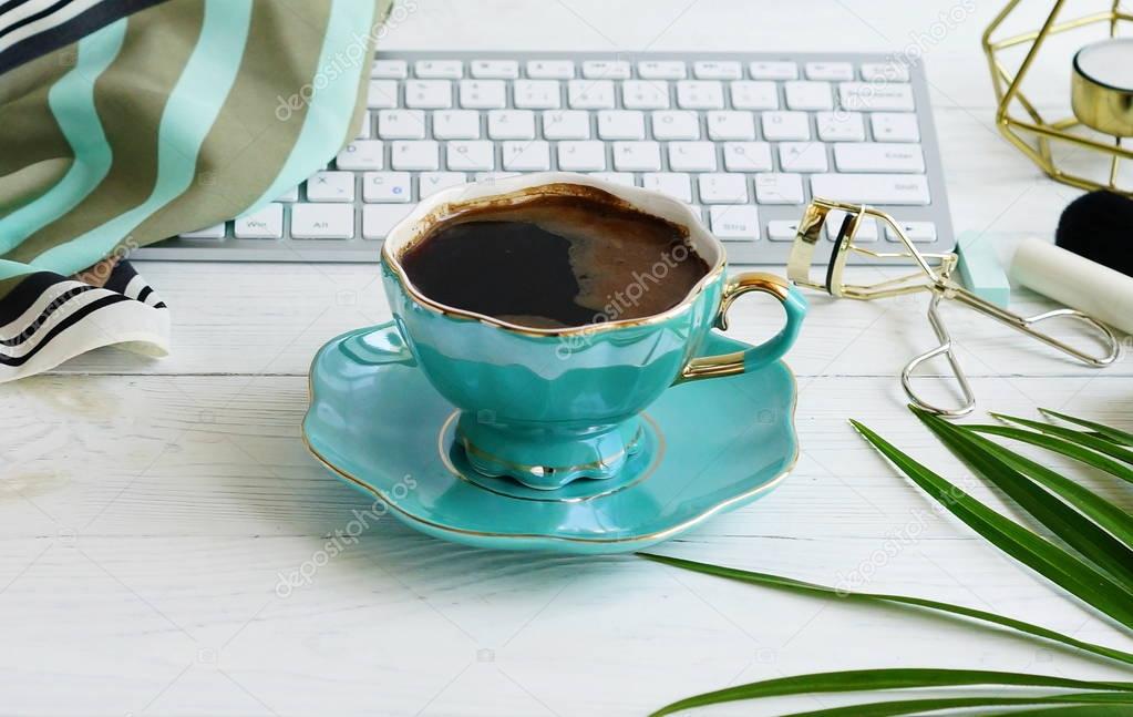 office feminine desk, female make up accessories, workspace with laptop, cup of coffee .Beauty blog concept