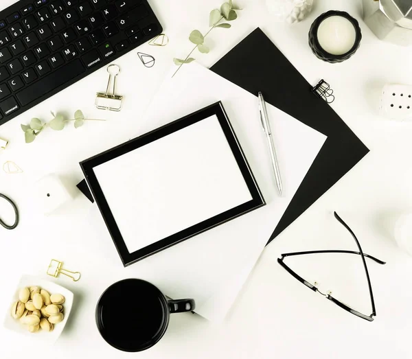 Flat lay home office desk. workspace with keyboard, cup of coffee, notebook, on white background. Copy space.Flat lay.Top view