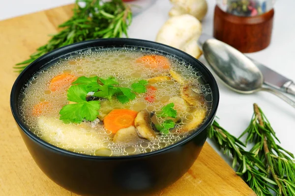 Homemade chicken soup with vegetables and mushrooms in a bowl. top view — Stock Image Homemade Chicken Soup Vegetables Mushrooms Bowl Top View Royalty Free Stock Images