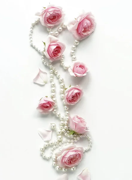Frame Pink Roses Beads White Background Feminine Desk Top View — Stock Photo, Image