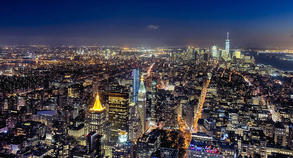 New York City, USA - October 5, 2016: New York panorama from Uptown to Downtown in the night, with a Census-estimated population of over 8.4 million in 2013 is the most populous city in the United States.