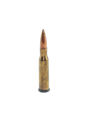 Old rifle bullet isolated on white background