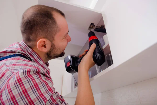 Workman Repair Door Cabinet Kitchen — Stock Photo, Image