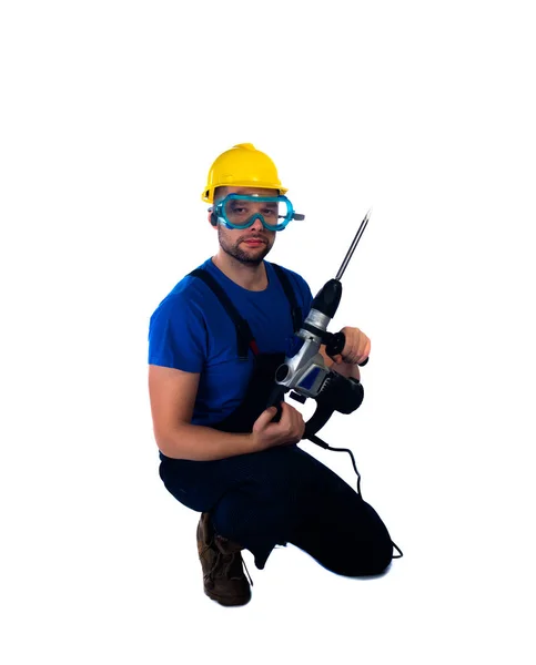 Young Workman Kneeling White Background — Stock Photo, Image