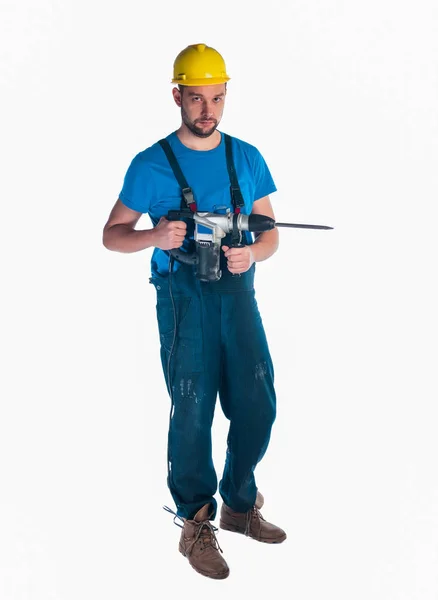 Handyman tenendo un trapano su sfondo bianco — Foto Stock