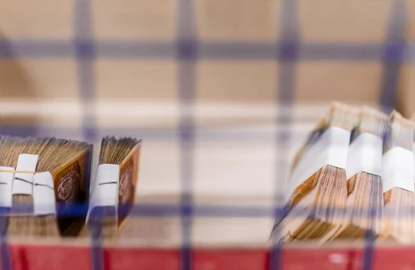 Boxes full with sorted money in treasury department — Stock Photo, Image