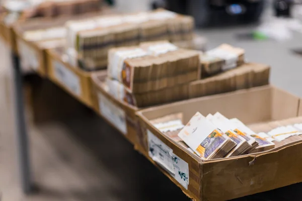 Carton boxes full of various types of banknotes — ストック写真