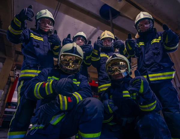 Portrait of group of firefighters wearing protective uniform ins — Stock Photo, Image