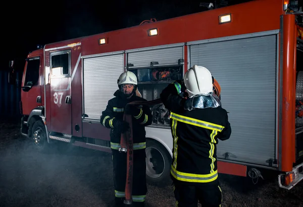 Fireman team during intervention — Stock Photo, Image