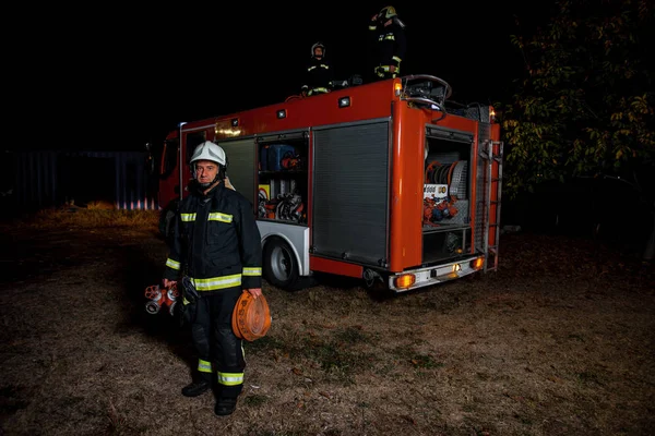 Fire brigade in action at night time