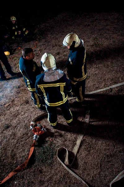 Firefighting operation at night — Stock Photo, Image