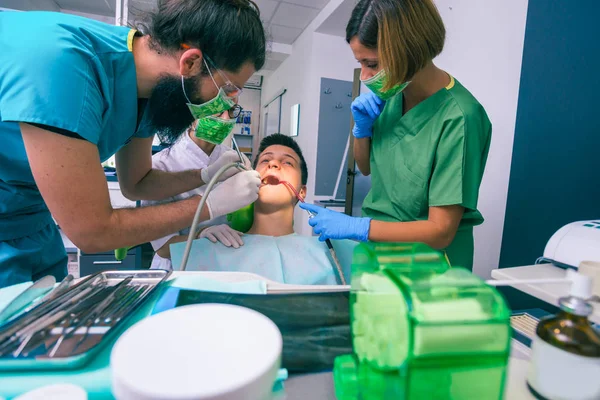 Team Dentists Treating Teeth Young Boy Patient Using Dental Tools — Stock Photo, Image
