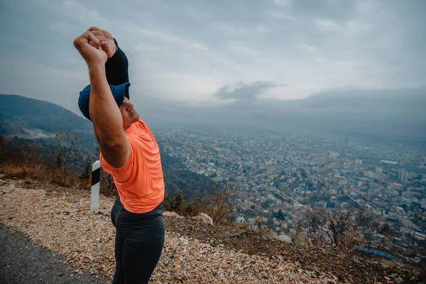 Muscular Mature Man Sportswear Stretching Outdoors — 图库照片