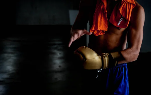 Man showing off his muscular physique. Photo of man with perfect body after training.