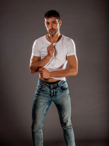 Stylish Fashion Guy Wearing Stylish Blue Jeans White Shirt While — Stock Photo, Image