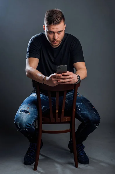 Cool Handsome Trendy Guy Wearing Stylish Black Shirt Blue Jeans — Stock Photo, Image