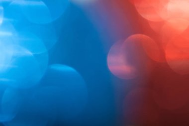 Kırmızı ve mavi bokeh, renkli parlak arkaplan ve bulanık.