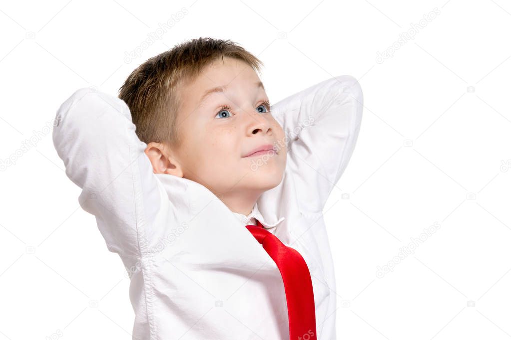 Confident smiling young businessman relaxing.. Isolated on a white background