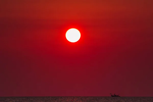 Fishing at sunrise on the sea — Stock Photo, Image