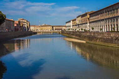 The river Misa in the historic center of Senigallia city clipart