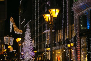 BUDAPEST, HUNGARY - DECEMBER 31, 2019: Beautiful view of fashion street at night with christmas decorations in the center of Budapest, Hungary