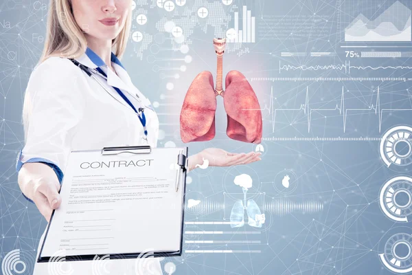 Double Exposure, Doctor holding human organs (lungs) and tablet, gray background . — стоковое фото