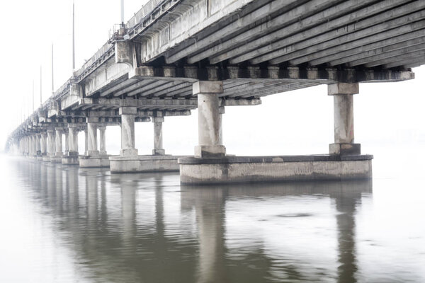 Bridge on foggy morning in Dnepr, Ukraine