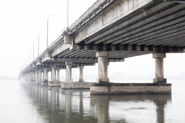 Bridge on foggy morning in Dnepr, Ukraine