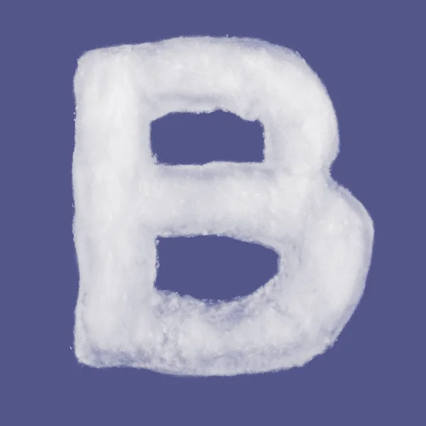 Winter alphabet, symbols made from cottonwool. Blue background isolated.All Letters. High resolution.