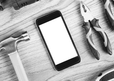 Smartphone ve inşaat araçları boş simgesi, en iyi görünüm için lay düz. Yelken araçları ve işçi kavramı.