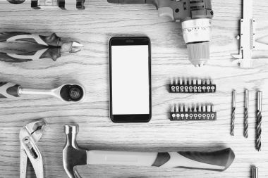 Smartphone ve inşaat araçları boş simgesi, en iyi görünüm için lay düz. Yelken araçları ve işçi kavramı.