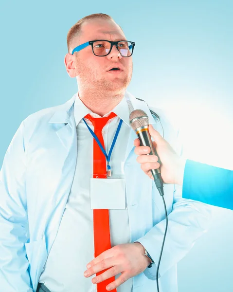 Portrait of young handsome happy male doctor.