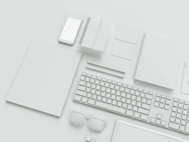 Modern ofis işyeri metalik dizüstü bilgisayar, dijital tablet, cep telefonu, kağıtları, not defteri ve diğerleri ile iş nesneleri ve öğeleri bir masanın üstüne yalan. Beyaz arka plan üzerinde izole.