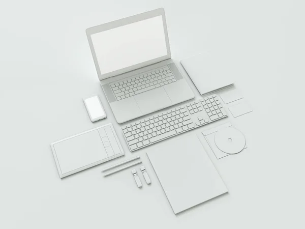 Moderna kontors arbetsplats med metalliska laptop, digital surfplatta, mobiltelefon, papper, anteckningar och andra business objects och artiklar liggande på ett skrivbord. Isolerad på vit bakgrund. — Stockfoto