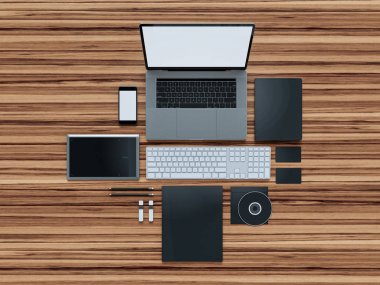 Computer, laptop, digital tablet, mobile phone, virtual headset and newspaper on wooden table. IT concept. clipart