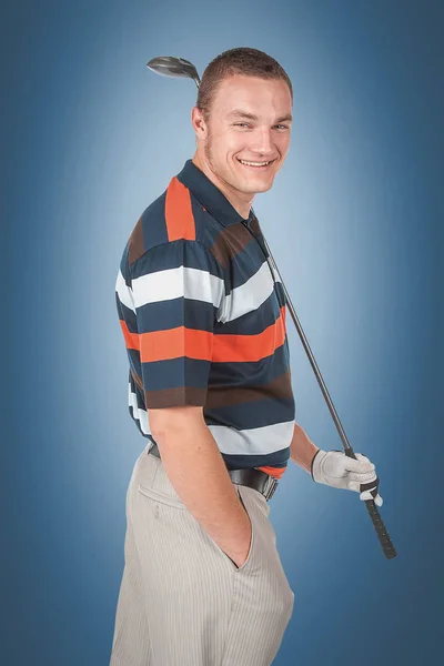 Emocional jugador de golf guapo posar en el estudio en azul y gree — Foto de Stock