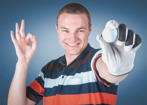 Emocional jugador de golf guapo posar en el estudio en azul y gree — Foto de Stock