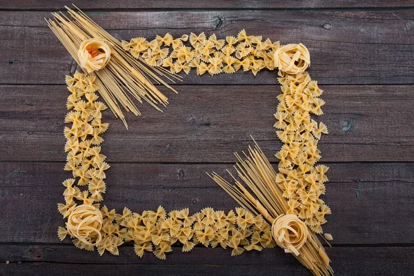 Sheaf of spaghetti. Components products. Cooking concept. Old wo Stock ...