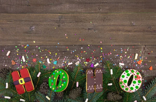 Galletas de Navidad sobre fondo de madera rústica, Studio shoot top view.Concepto de confort en el hogar y vacaciones —  Fotos de Stock